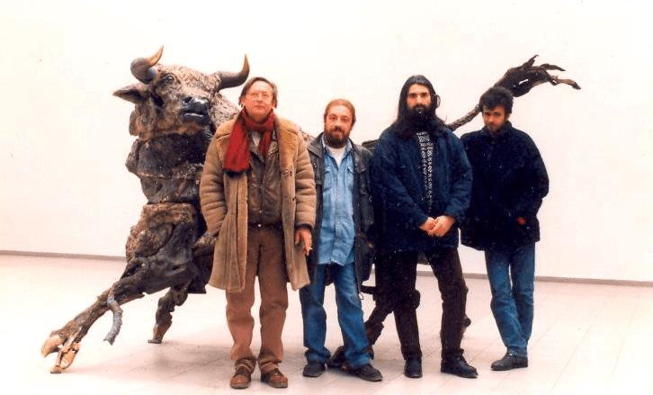 Lubomir Lazarov and other artists in front of a sculpture of bull