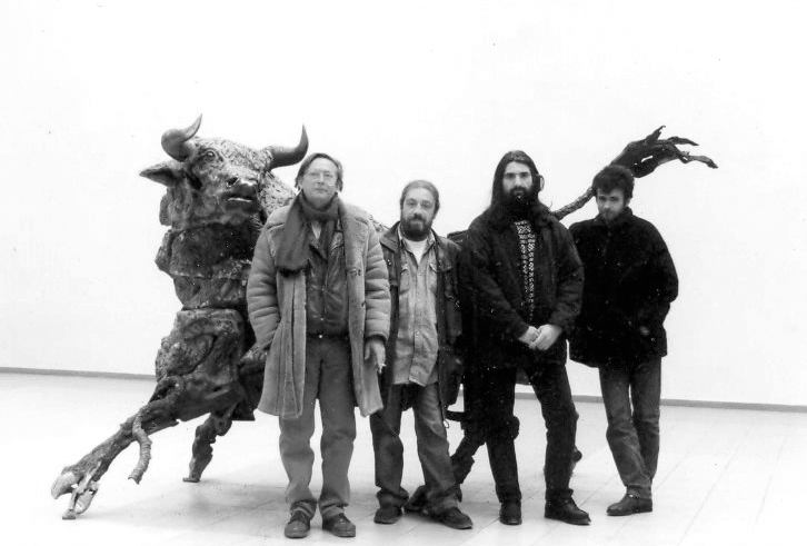 Lubomir Lazarov and other artists in front of a sculpture